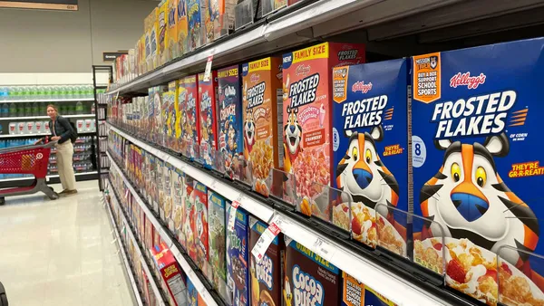 Boxes of cereal are displayed on a shelf