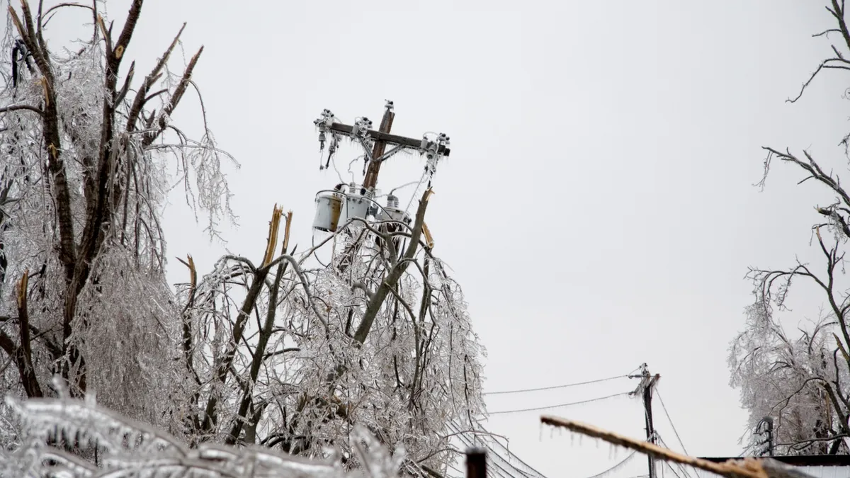 Icy Power Pole Falling stock photo