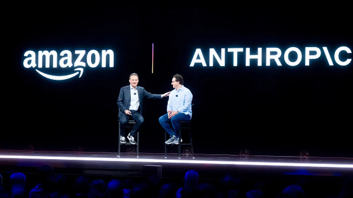 AWS CEO Adam Selipsky speaks with Anthropic CEO and co-founder Dario Amodei during AWS re:Invent 2023 at The Venetian on November 28, 2023 in Las Vegas, Nevada