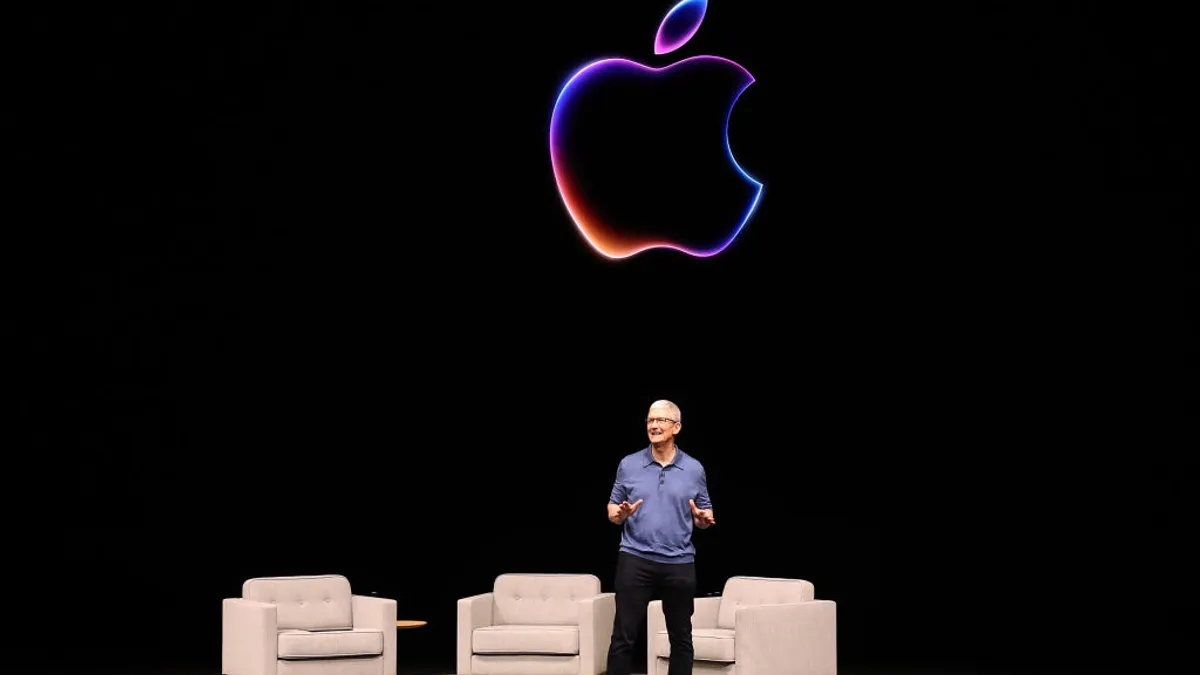 Apple CEO Tim Cook delivers remarks at the Apple Worldwide Developers Conference on June 10, 2024, in Cupertino, California.