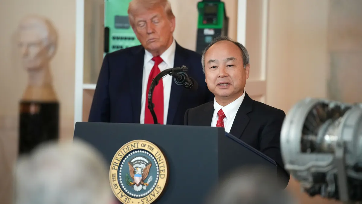 A man at a podium in a suit