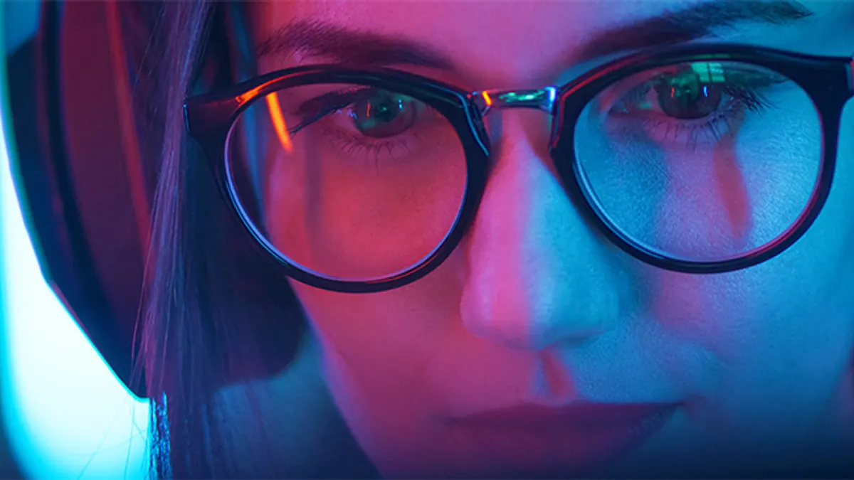 Portrait of Girl Sitting Before Computer