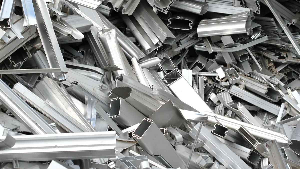 A pile of silver pieces of scrap metal.