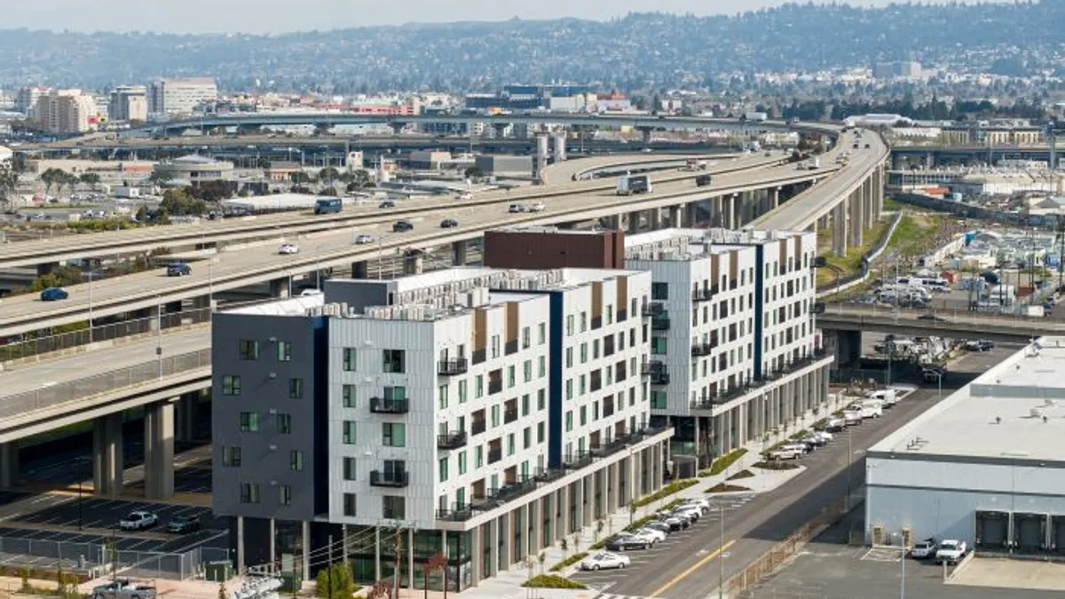 an aerial view of a modern apartment building