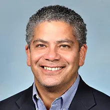 This is a headshot of Andrés Henríquez, director of STEM education strategy at Education Development Center.