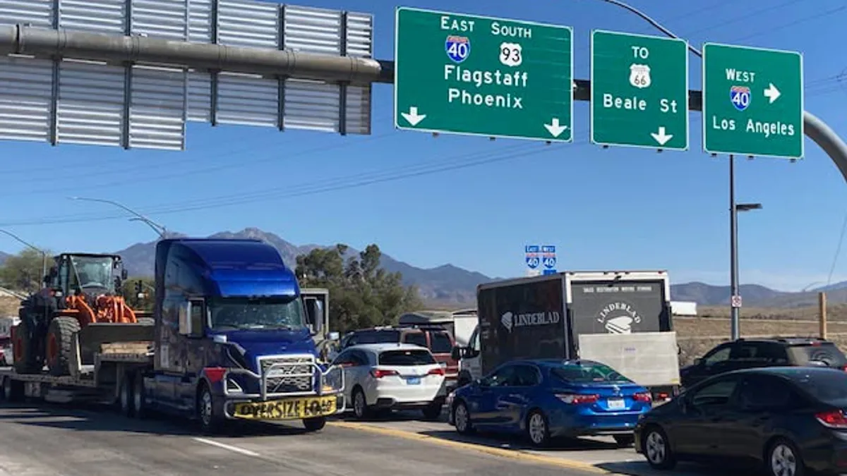 A stretch of highway with a sign that says I-40