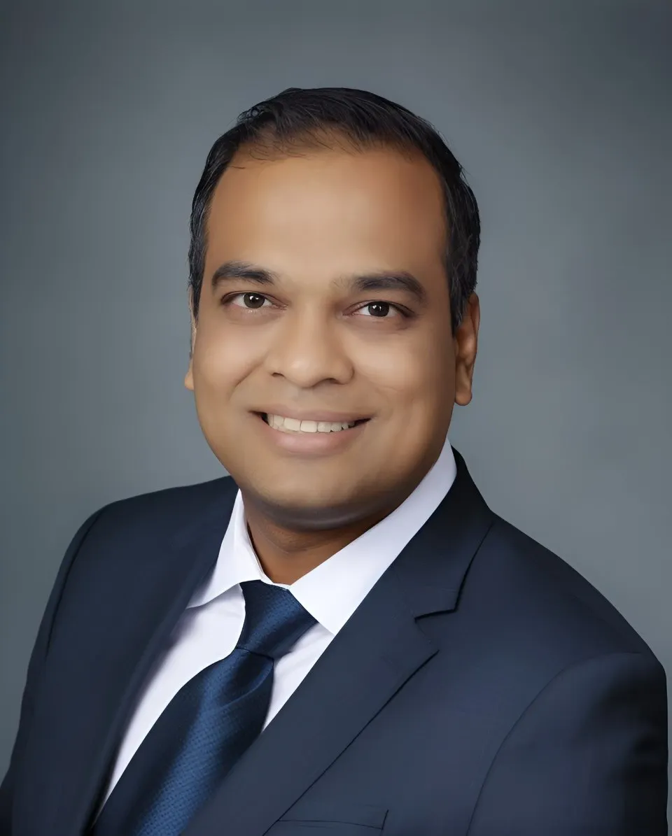 A headshot of Praveen Rao, Google Cloud's global head of manufacturing.