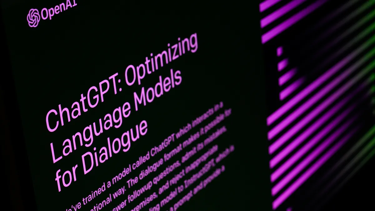 A computer screen is seen with the text: "ChatGPT: Optimizing language models for dialogue"