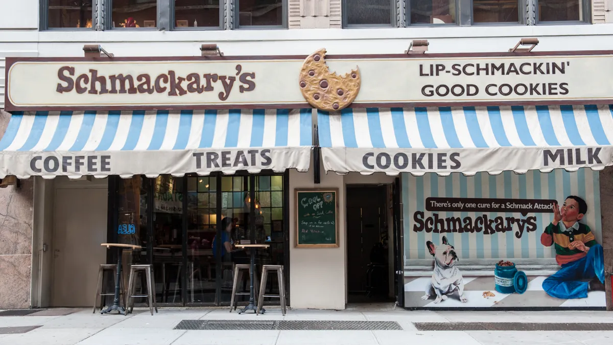 An exterior image of Schmackary's cookie shop in NYC.