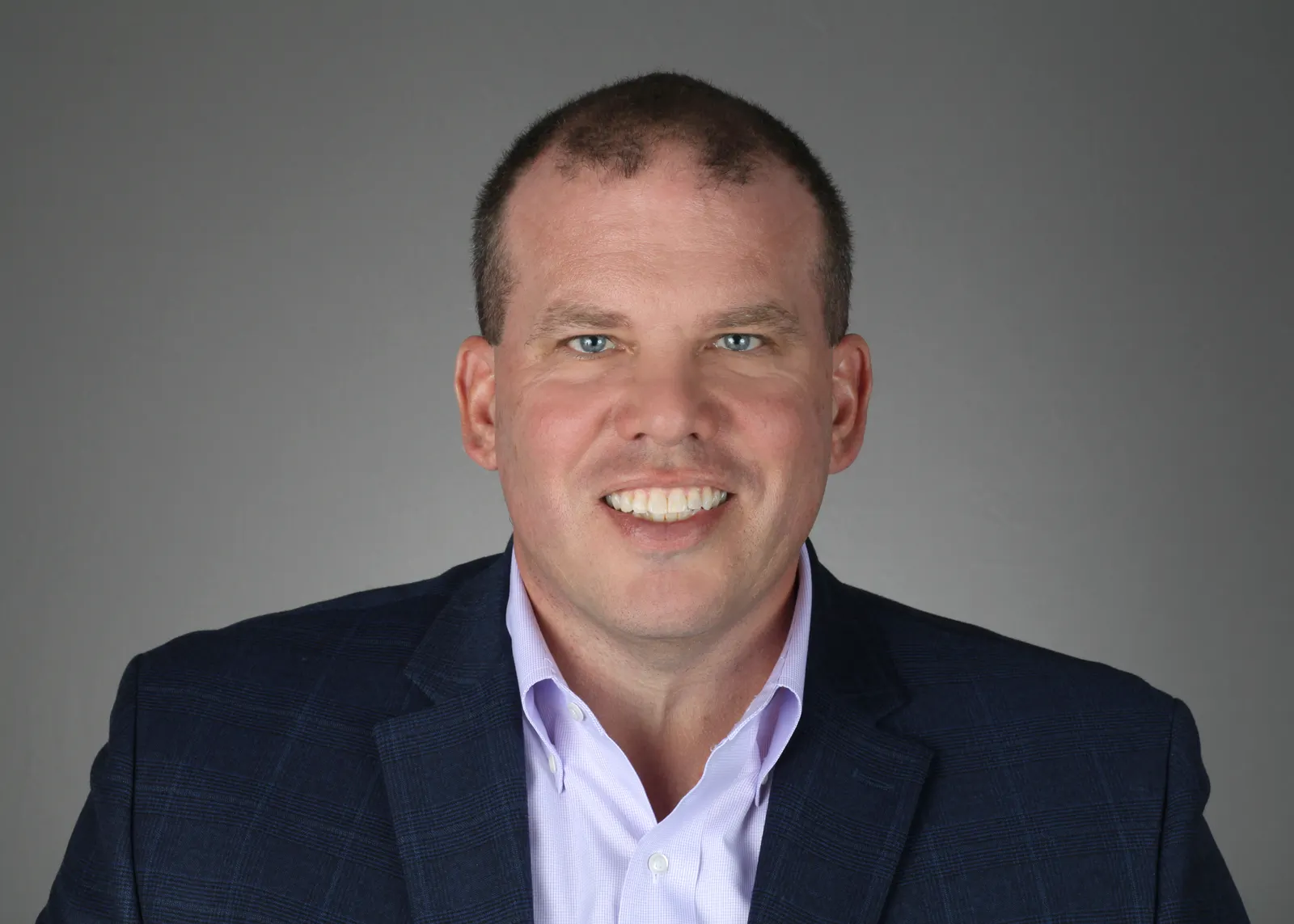 A headshot of Charles Conroy, CEO of Nucleus RadioPharma.