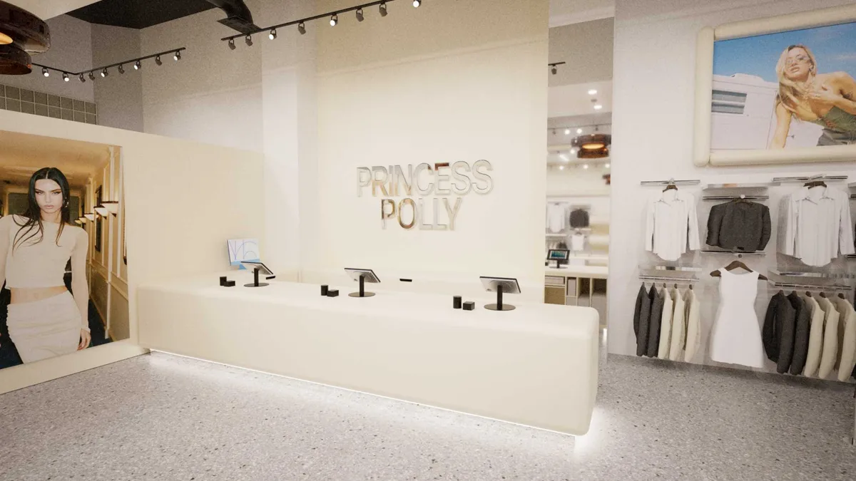 Interior of a Princess Polly store in Los Angeles showing the beige colored checkout counter