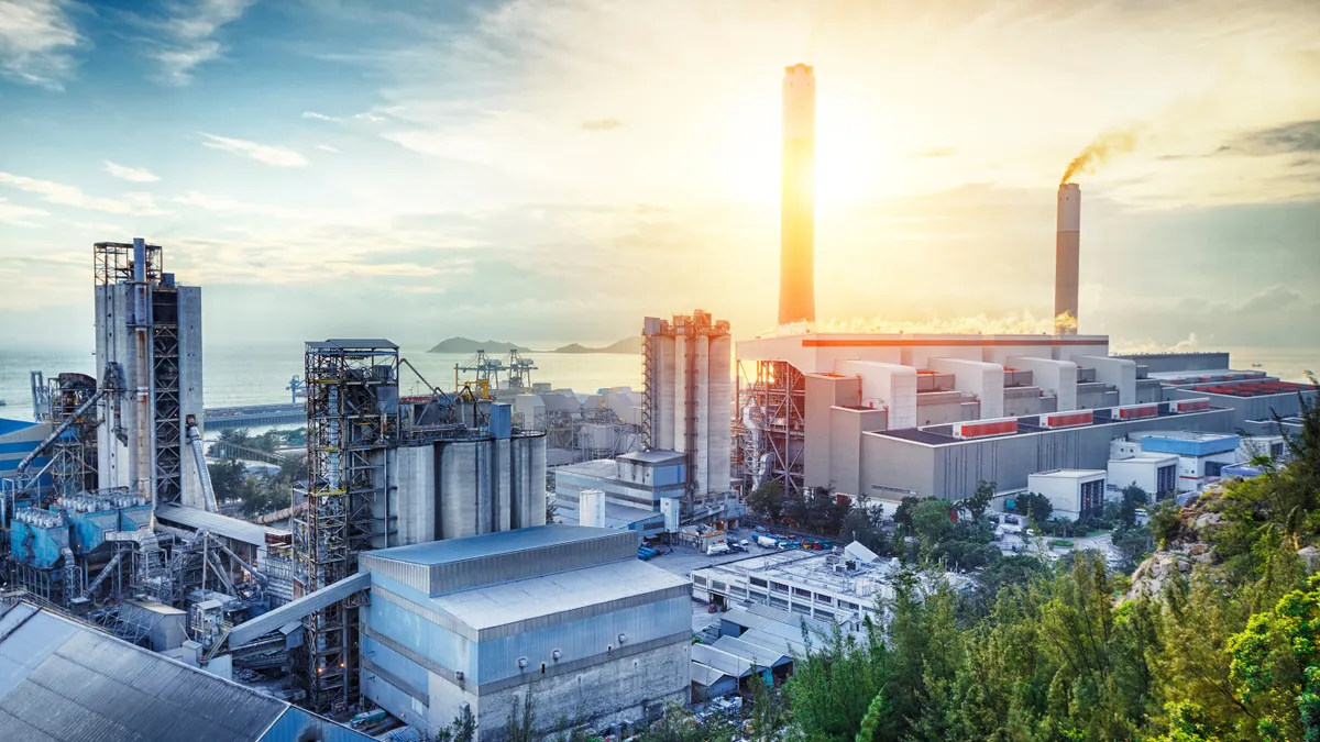 A glow light from a coal-fired power station at sunset