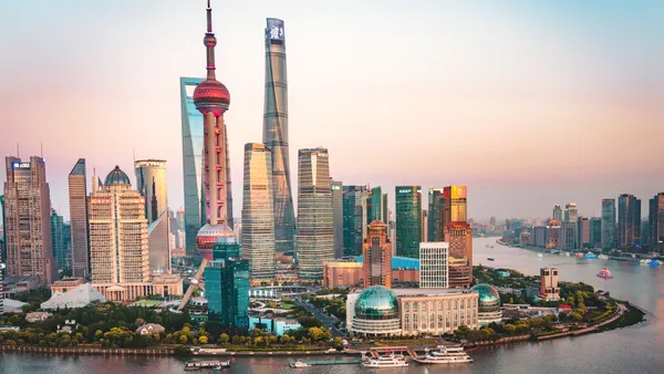 A view of Shanghai's skyline at dusk.