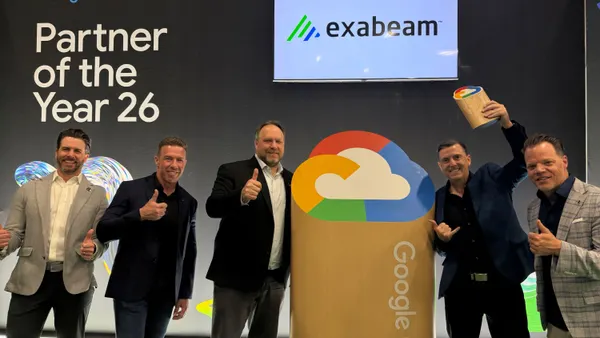 five men standing celebrating