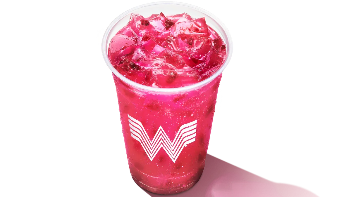 An image of a dark pink drink in a cup with a giant W on it.