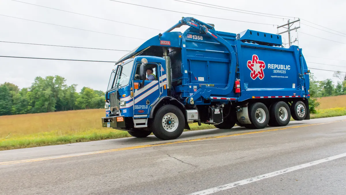 Republic Services collection truck driving