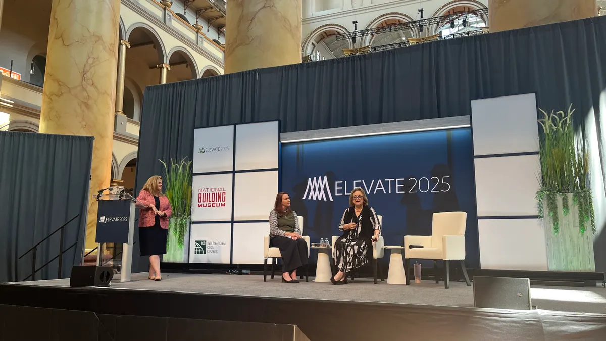 Panelists on stage at the National Building Museum in Washington, D.C., discuss workforce trends.