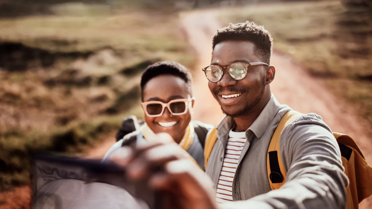 Two people taking a selfie.