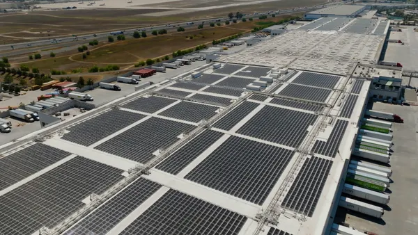 Solar panels atop a building.