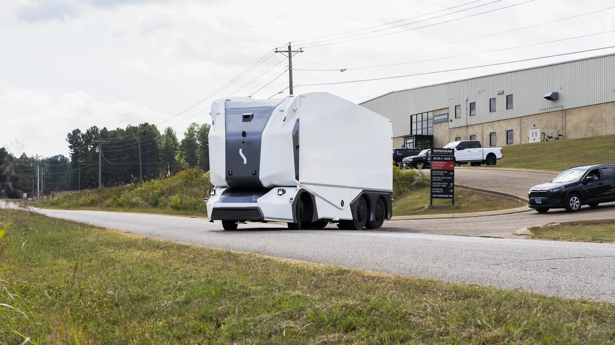 An autonomous Einride vehicle pulls out onto a roadway in Selmer, Tennessee.