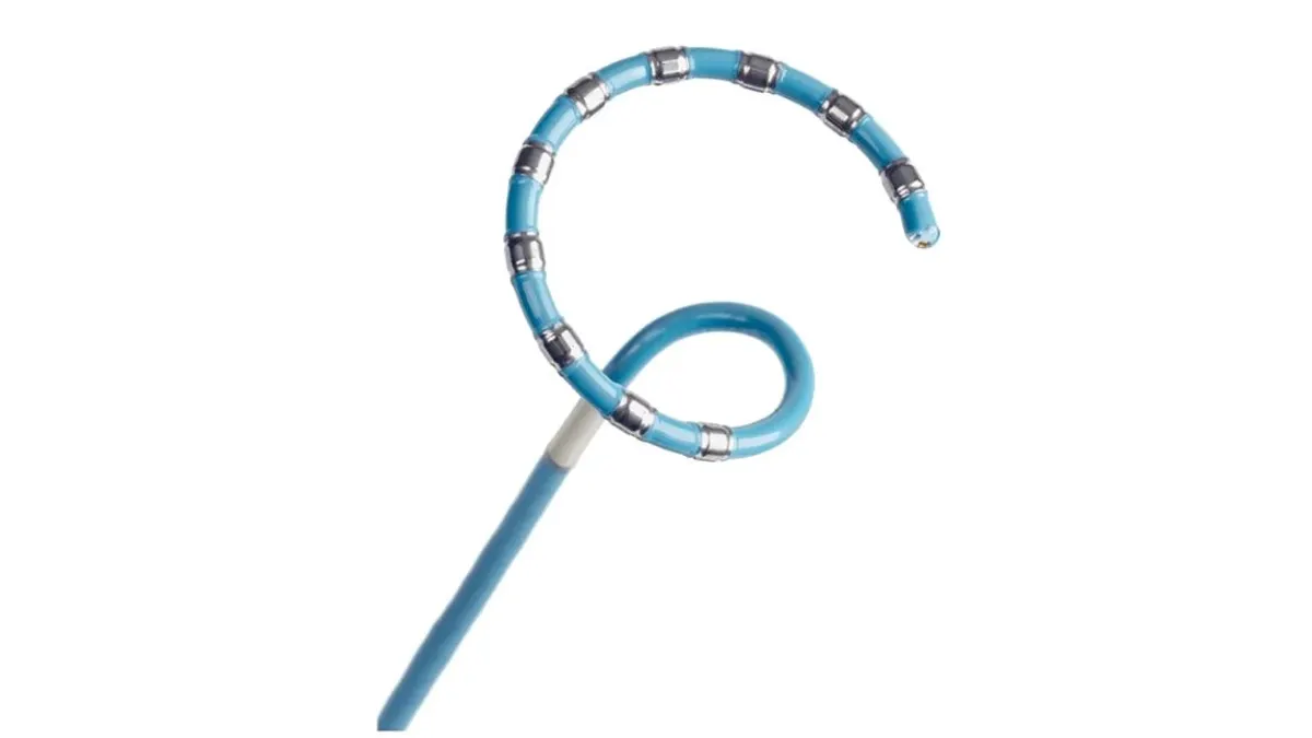 A picture of a blue pulsed field ablation catheter against a gray background.