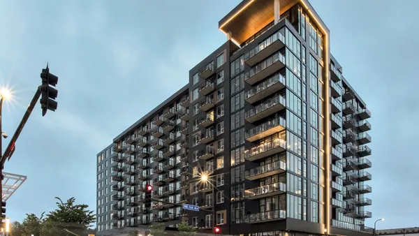 Modern, dark, 10-story apartment building