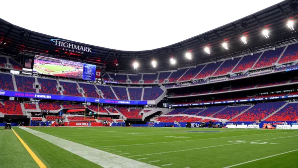 A view of a professional football stadium at field level.