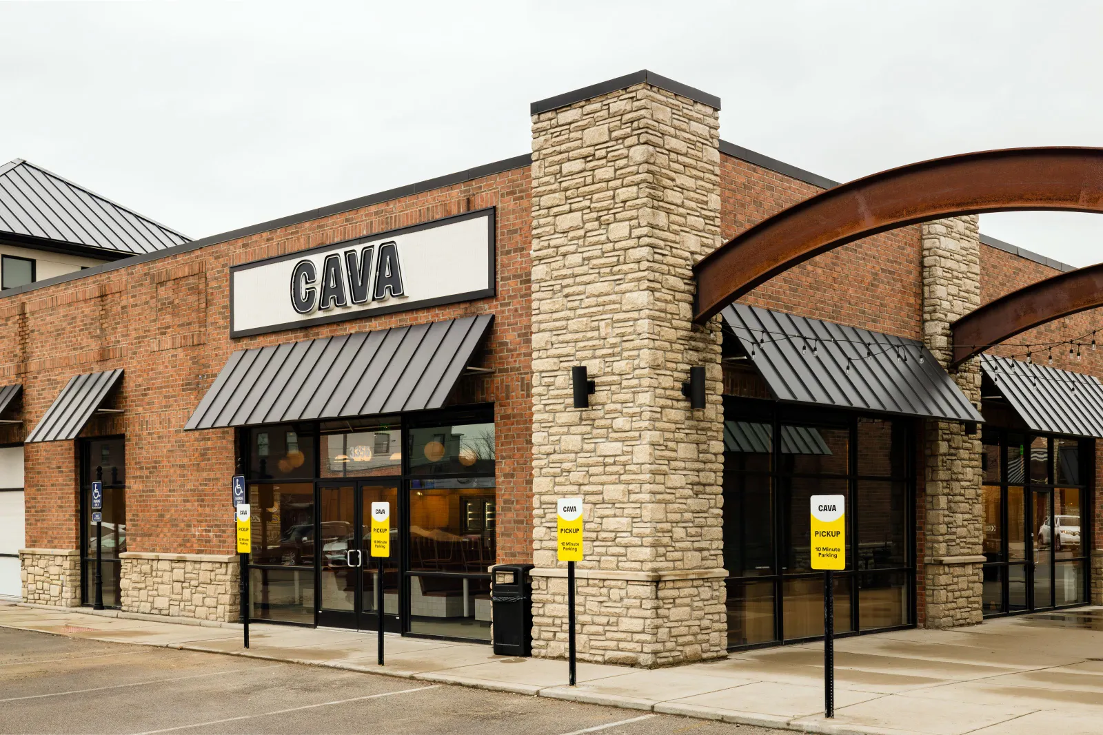 An image ofa brick Cava storefront