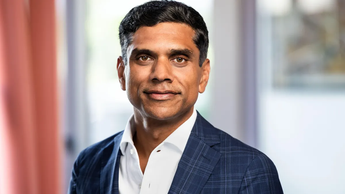 A horizontal headshot of Simeon George, CEO of SR One.