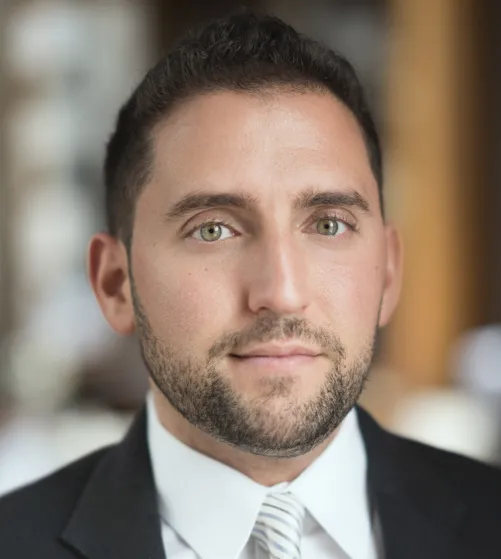 Dark haired man in suit