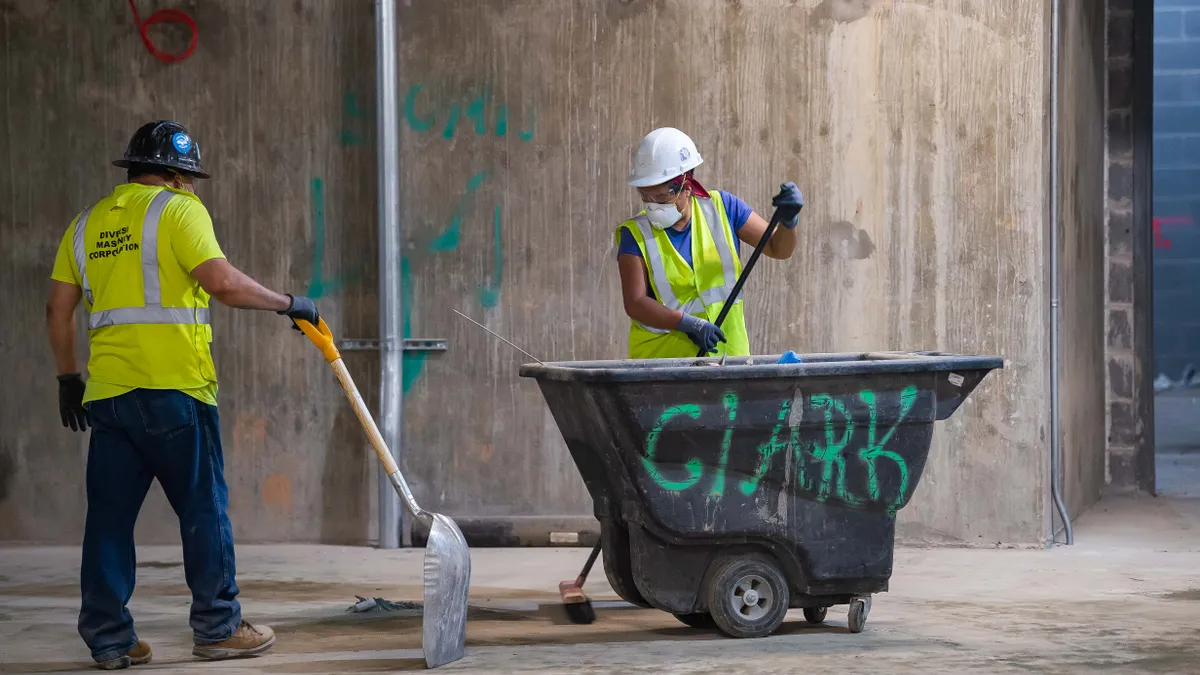 Two workers on construction site