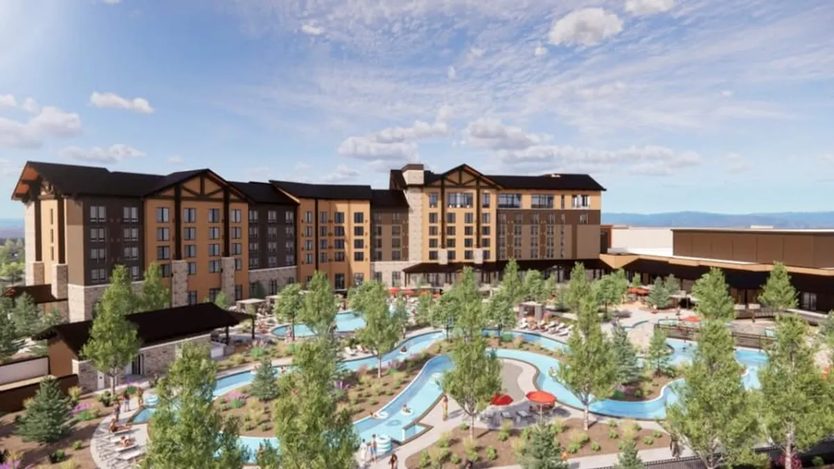 A rendering shows a resort hotel surrounded by a lazy river pool.
