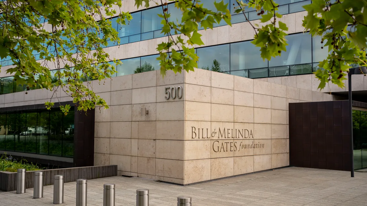 A sign on a wall reads "Bill & Melinda Gates Foundation."