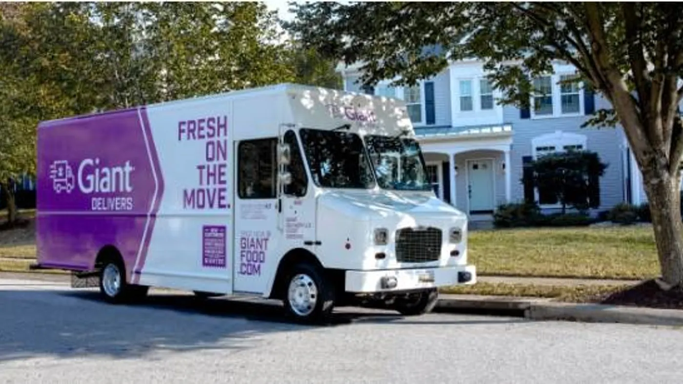 Giant Delivers truck outside a home