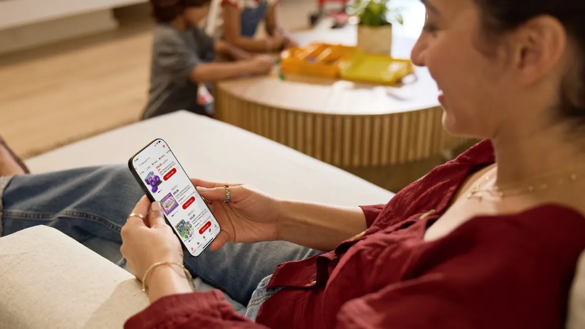 Woman shops from Target on a smartphone