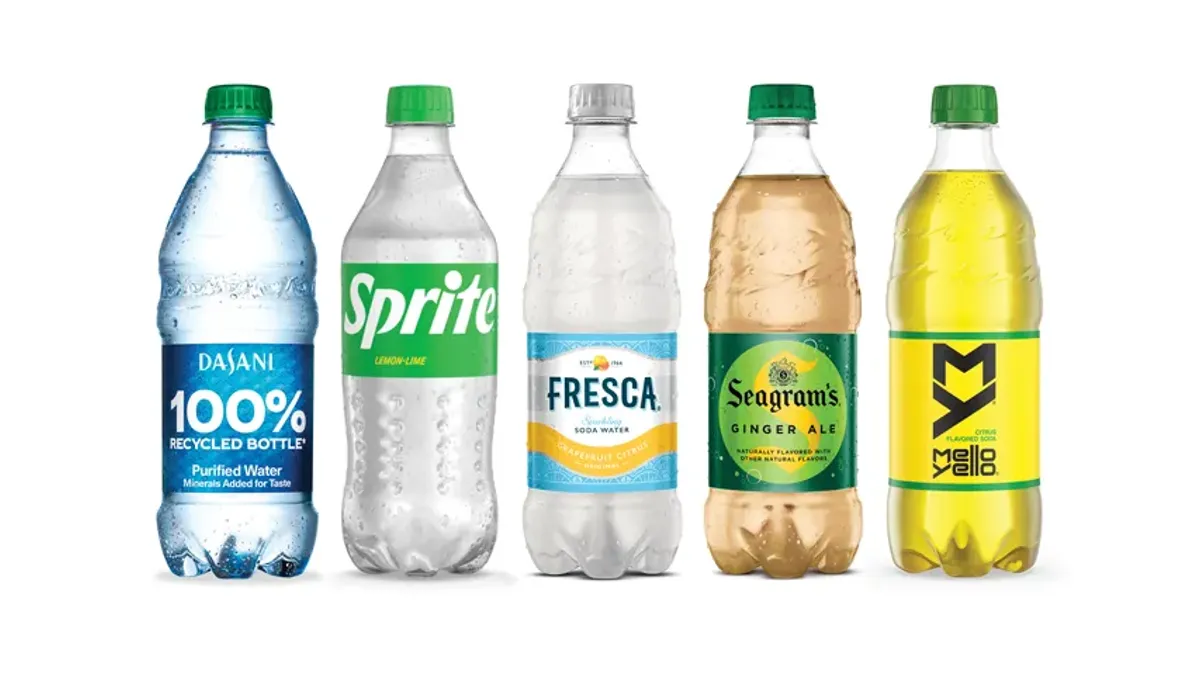 Clear plastic bottles of five Coca-Cola beverages: Dasani water, Sprite, Fresca, Seagram's ginger ale and Mello Yello.