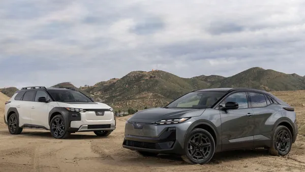 A 2026 Subaru Trailseeker and 2026 Subaru Uncharted are parked next to each other on a dirt off-road course in California.