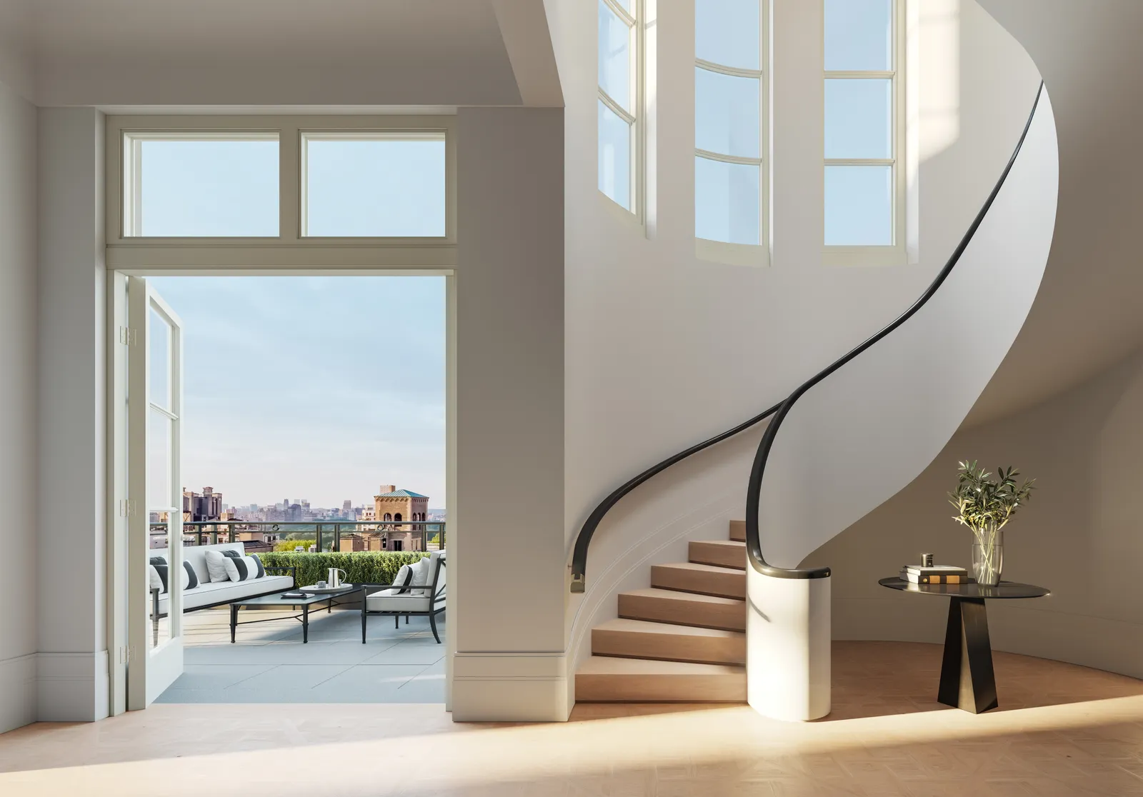 A room with white walls, a curved staircase, and windows opening onto a clear blue sky.