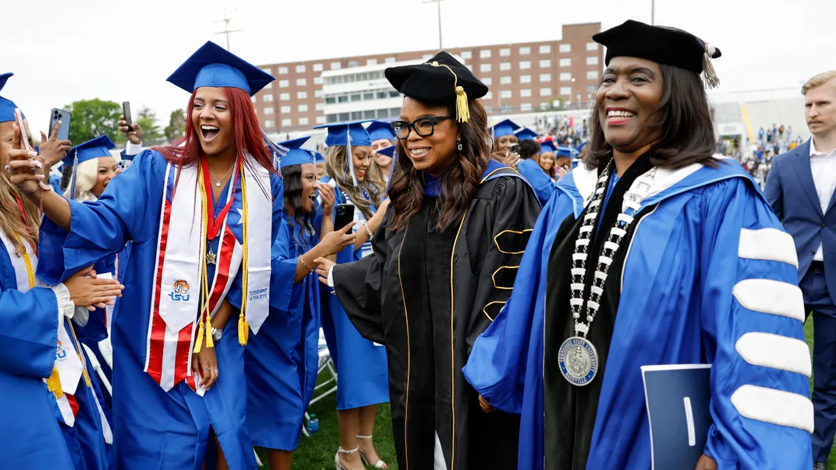 The president of a Tennessee State University wears graduation regalia.