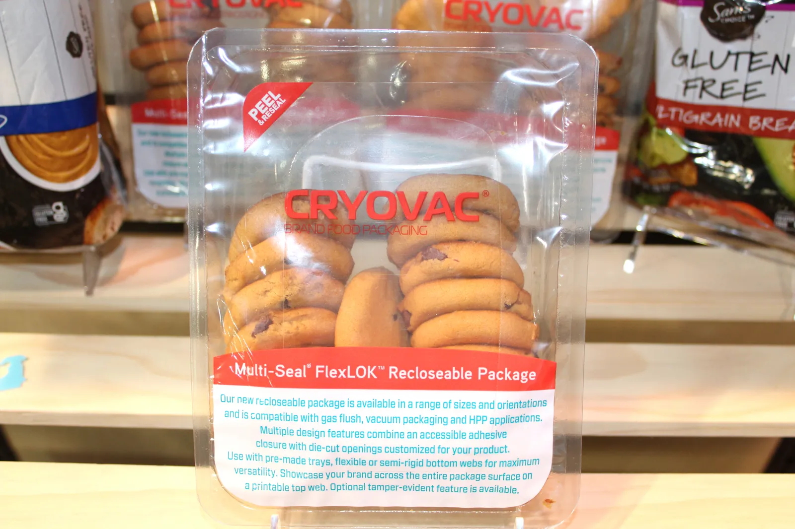 Cookies are housed in a clear plastic try with a reclosable plastic film cover.