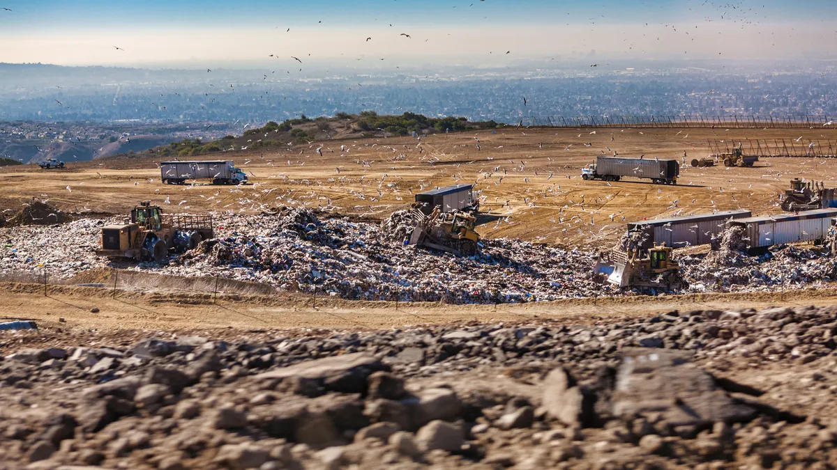 Southern California Landfill with trash, blue sky, seagulls