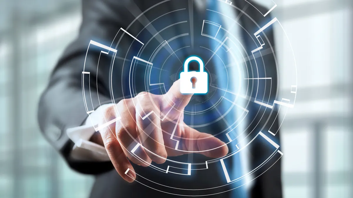 Abstract concept art of person pushing a holographic padlock, symbolizing proactive enterprise security, human oversight in cyber defense and safeguarding critical data infrastructure against threats.