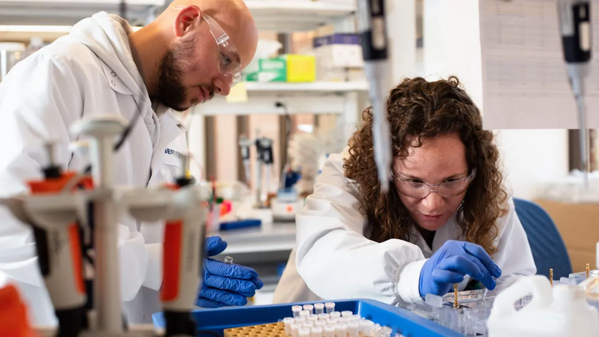 Colleagues working in a lab