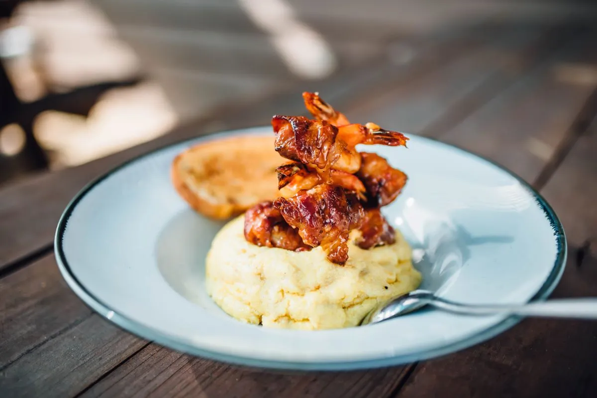 An image of voodoo shrimp and grits at Walk-On's.