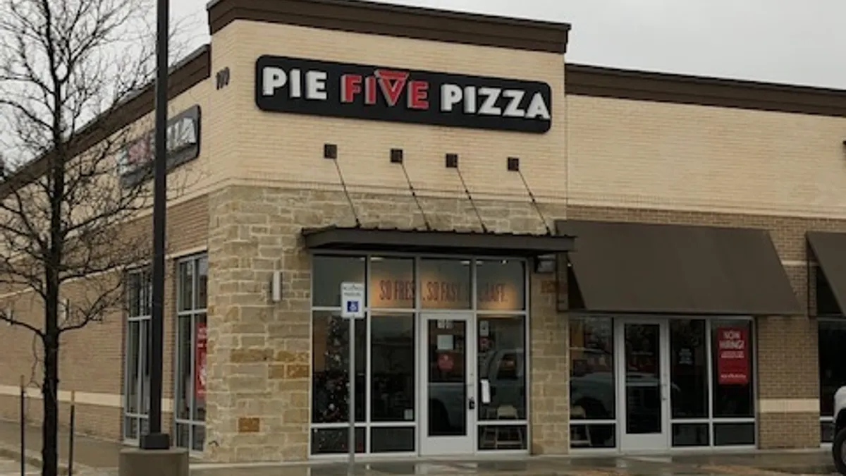 An image of a beige building with Pie Five logo on the outside.