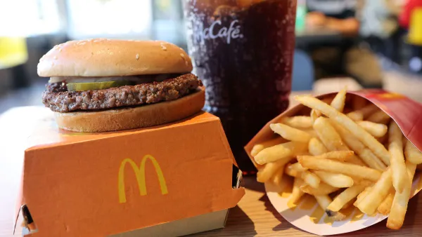 An image of a McDonald's Quarter Pounder, fries and a coke.