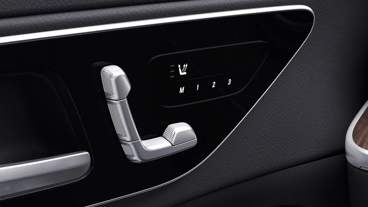 The driver seat controls buttons of a Mercedes-Benz vehicle.