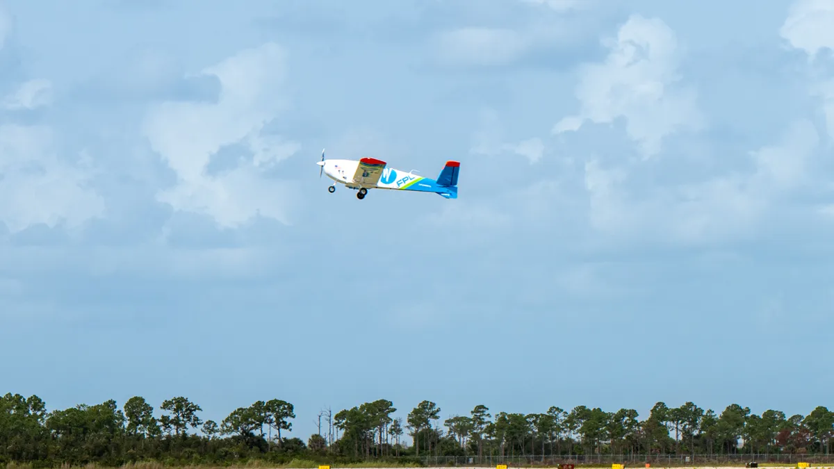 Florida Power & Light drone takes off at airfield.