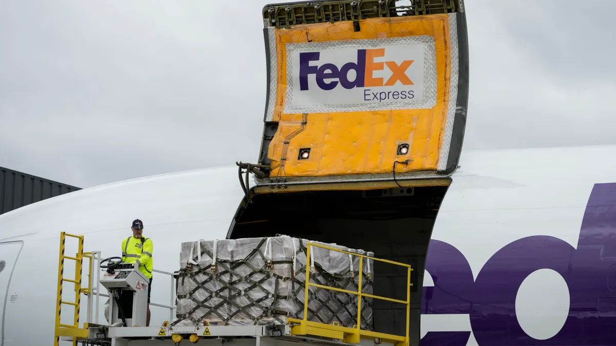 Pallets of baby formula are unloaded from a FedEx cargo plane upon arrival at Dulles International Airport on May 25, 2022 in Dulles, Virginia.