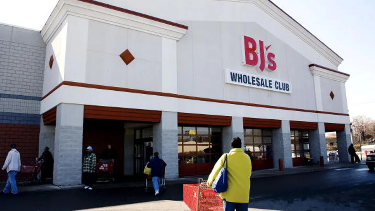 Customers enter BJ's Wholesale Club February 21, 2007 in Philadelphia, Pennsylvania.